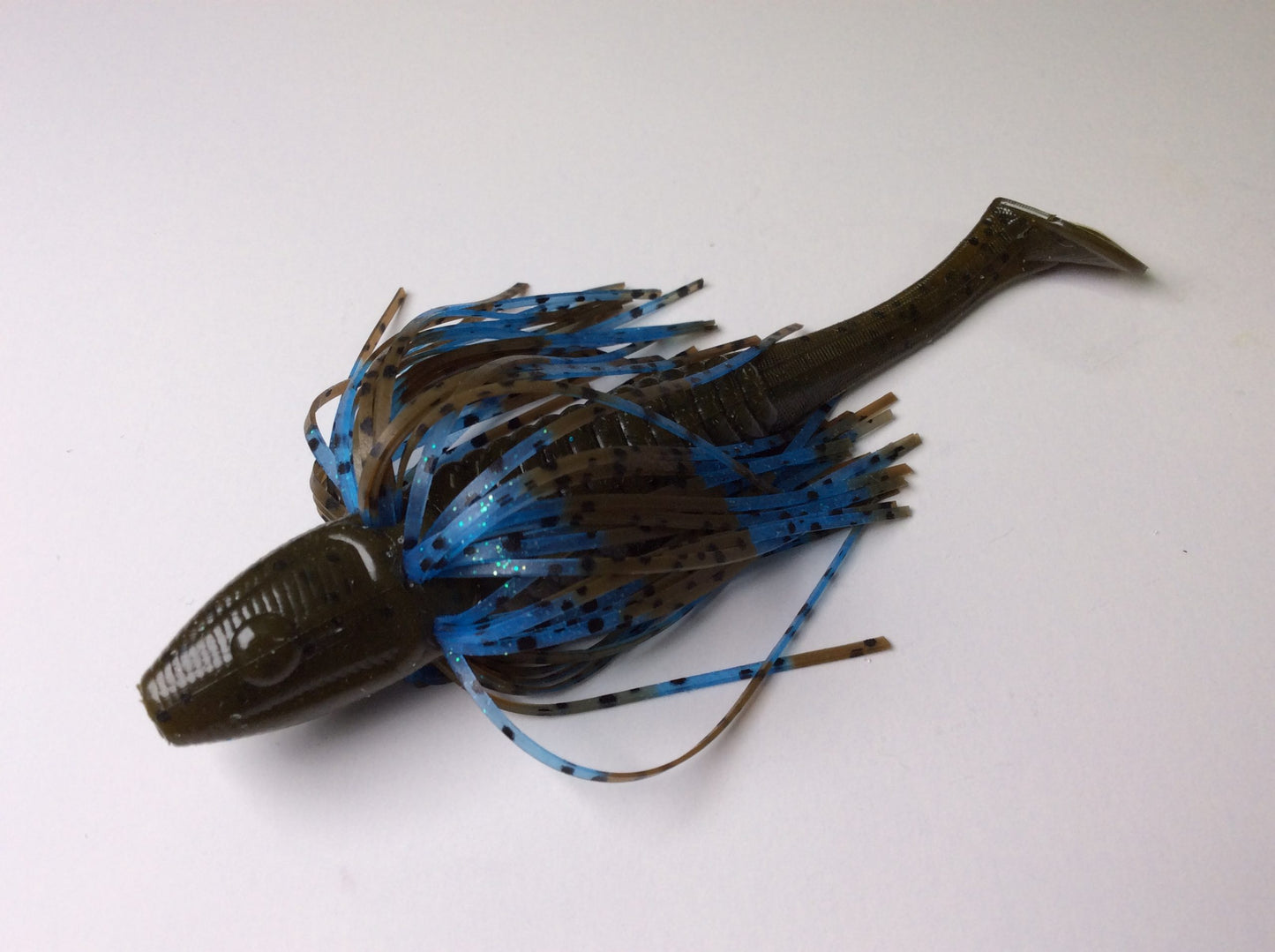 Tightlines UV Whisker Sow Belly Rattling 5" - UV Green Pumpkin/Blue Black w/ Blue Sheen  4pk